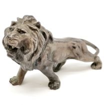 Antique cast metal figure of a male lion - 12cm across x 9cm high