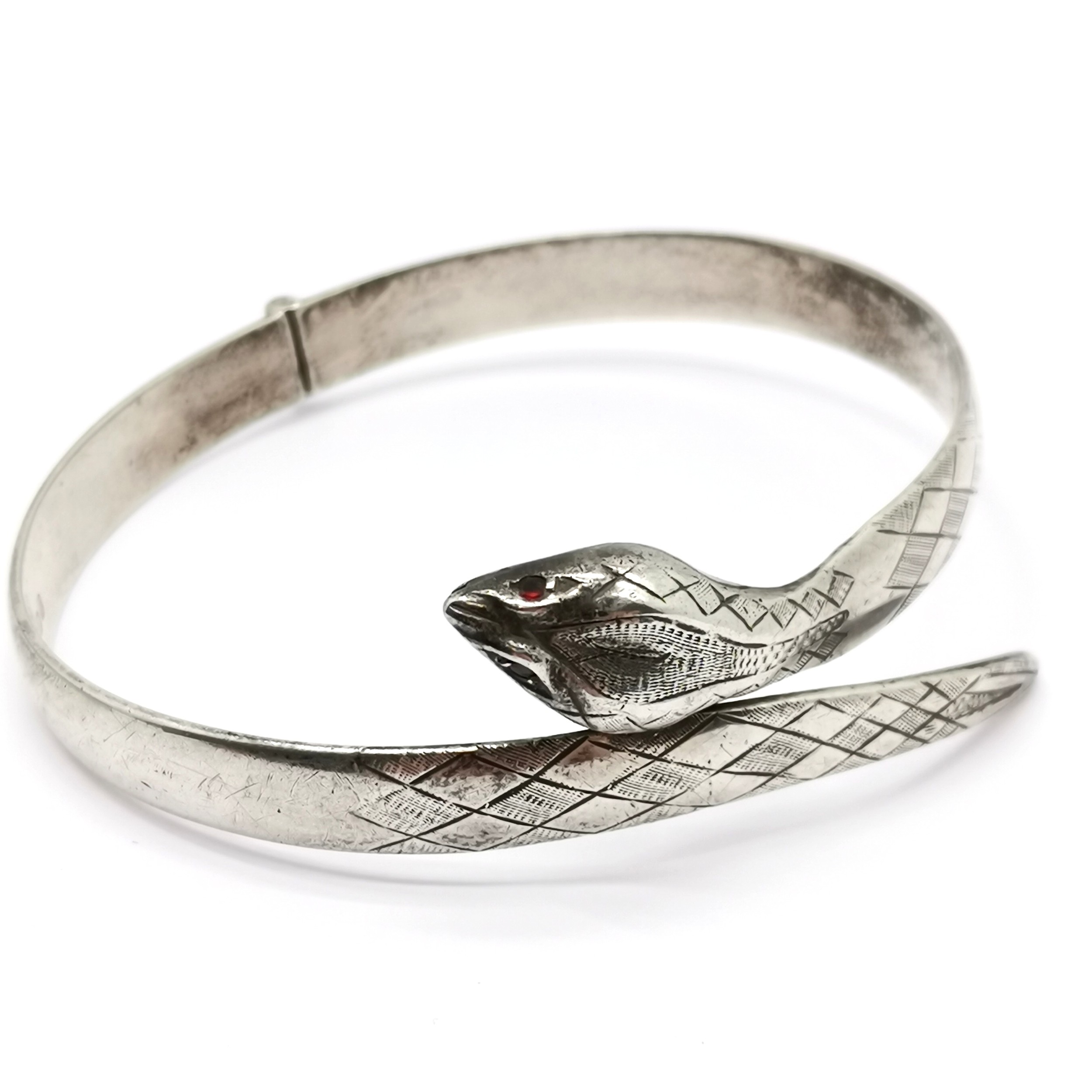 Silver hallmarked snake bangle with garnet eyes by Fred Manshaw Ltd t/w silver 7.5cm diameter bangle - Image 2 of 4