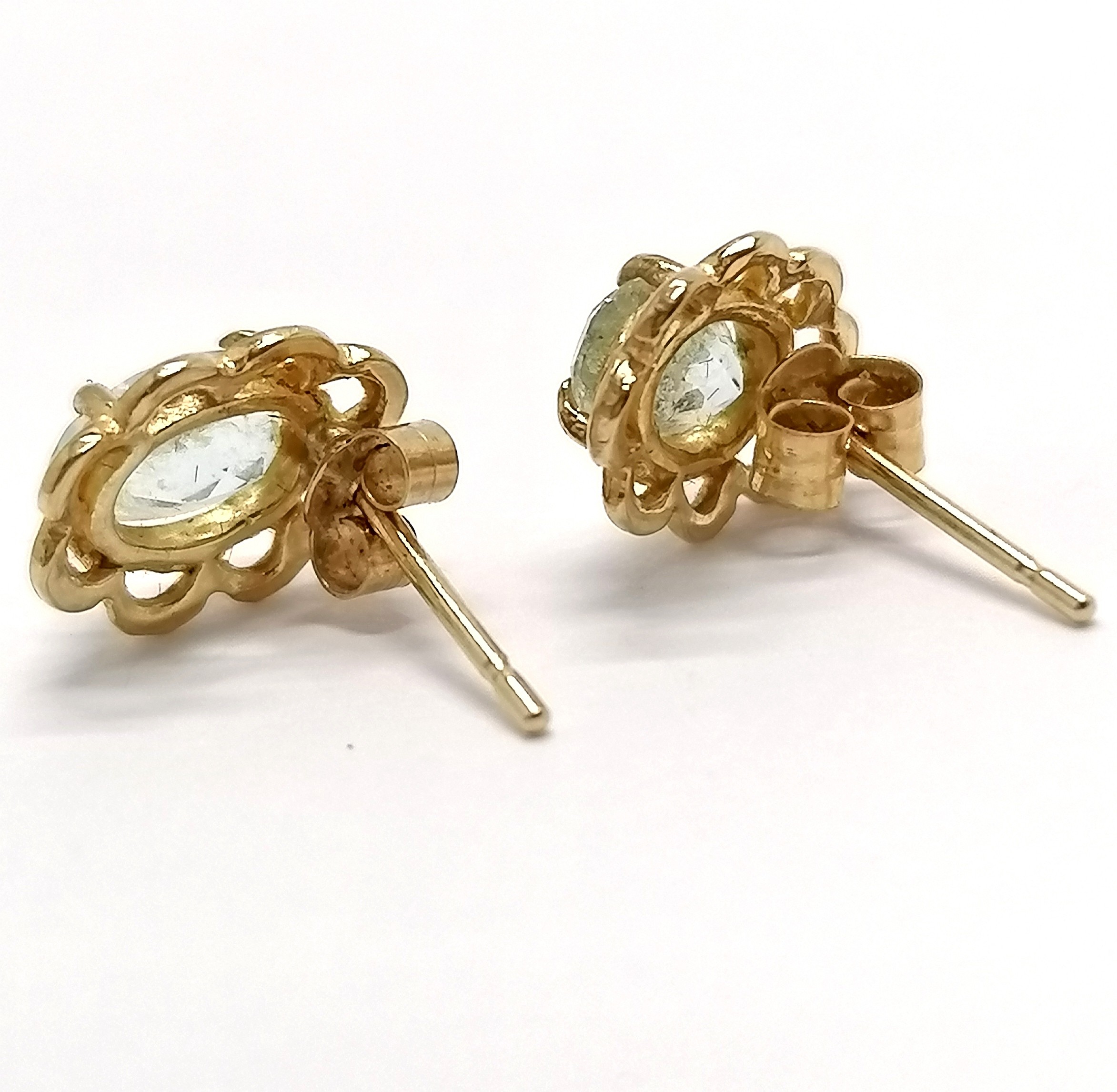 Pair of unmarked gold blue topaz stone set earrings - 1.1g total weight - SOLD ON BEHALF OF THE - Image 2 of 2