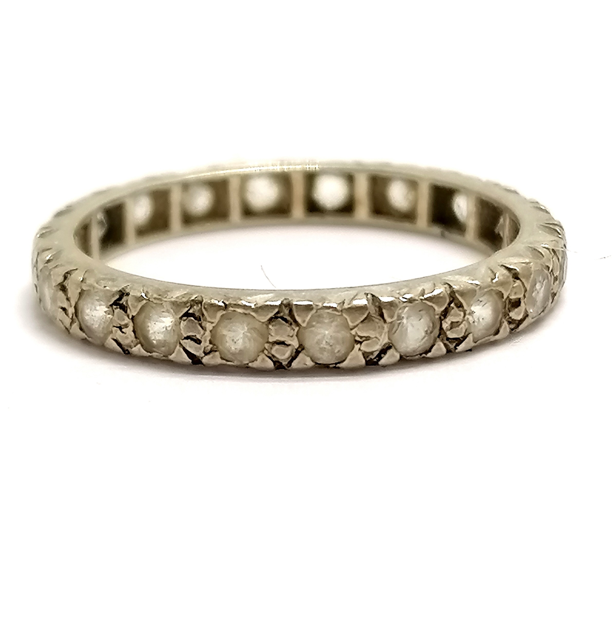 Unmarked white gold (touch tests as 14ct) white stone set eternity ring - size L½ & 1.7g total - Image 2 of 2