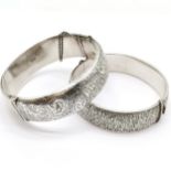 2 silver bangles - bark effect 1972 by Rigby & Wilson (Pat 897224) & 1963 by T H Ltd (slight