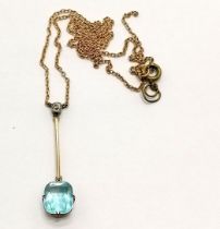 Antique unmarked gold blue & white stone set pendant (3cm drop) on an a/f gold neckchain with