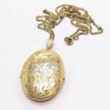 9ct hallmarked gold oval locket pendant with engraved detail to front (4.5cm) on a 9ct hallmarked