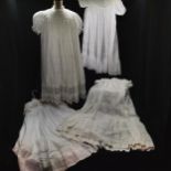 4 Edwardian baby gowns in good condition with lace and embroideries.
