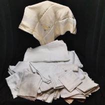 Large lot of white tablecloths, huckaback towels, damask napkins, etc, some coloured.