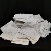 Joblot of pillowcases and sheets with embroidery details. All in used condition.