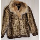 1980s short animal fur jacket, fox fur collar timmed with brown leather, by Au Tigre Royal, Tours,