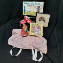 Lot of children's items to inc winnie the pooh fuzzy-felts, small Chinese shoes, Indian doll,