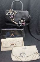 4 handbags, two cream, one black patent and one black floral