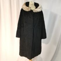 1950s Black astrakhan coat with faux fur collar good worn condition with slight damaged to fastener.