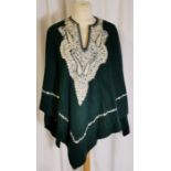 Felted green wool cape embroidered in cream slight staining to front