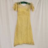 1930s lined overlayed with net dress in lemon - staining and small holes throughout - 74cm bust