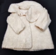 Childs cream fur fabric coat in good condition.