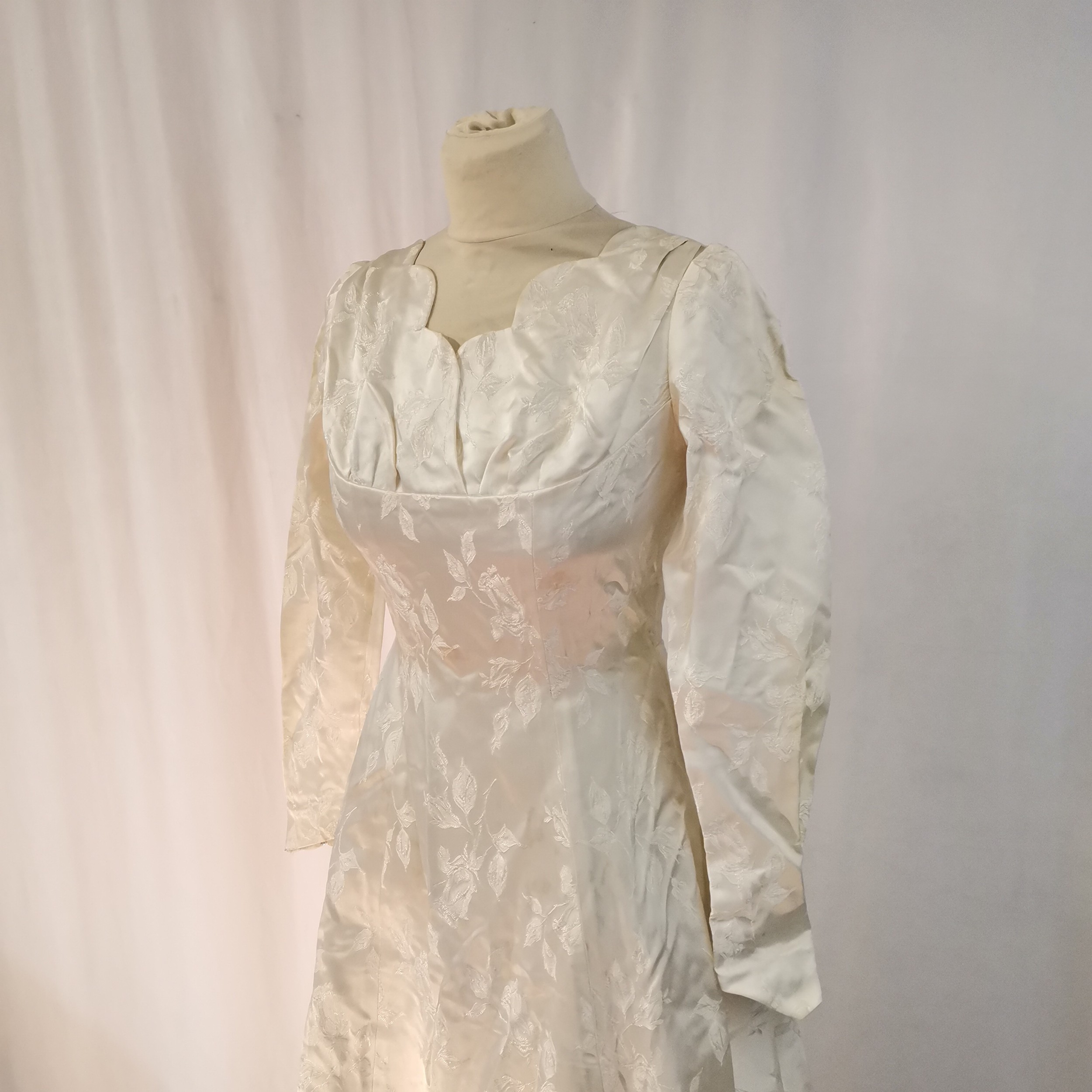 1950s Satin long sleeved wedding dress measuring 92cm bust. In used condition with staining to the - Image 2 of 4