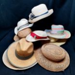 9 Straw womens hats, 1 with a badge in a variety of colours - used condition