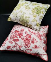 2 Floral cotton cushions 1 red, 1 green both in good condition.