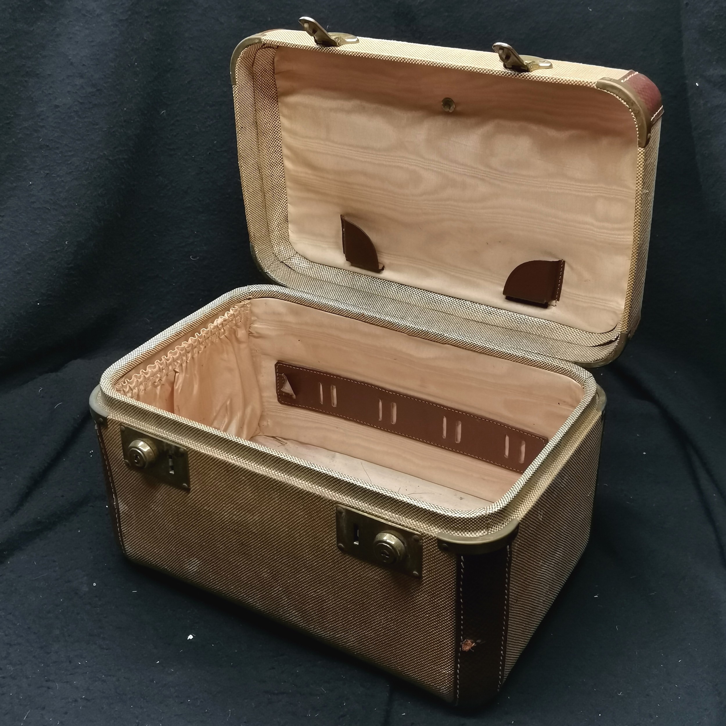 Vintage vanity box with leather trim. Some signs of damage.