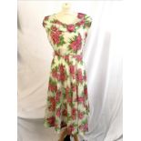 1950's Summer dress a cream background decorated with all over roses pattern with silk slip 94 cm