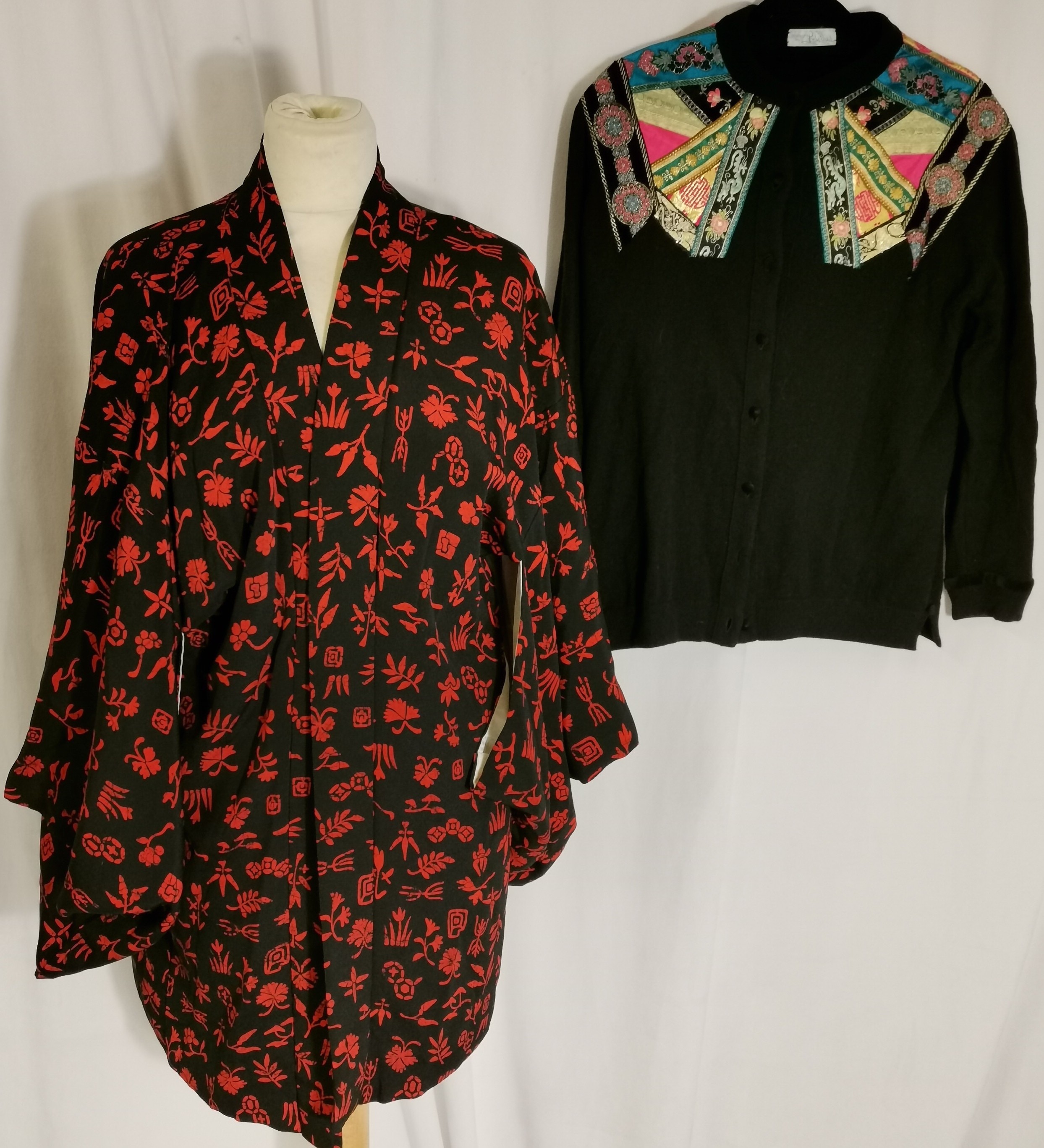 Red and black kimono jacket t/w wool black cardigan with chinese inspired applique trims by Lee