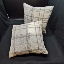 2 Grey tartan cushions in good condition.