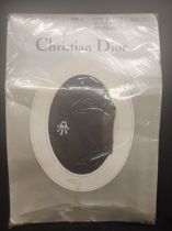Pair of Christian Dior tights size 4 US with diamante decoration