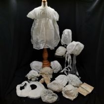Collection of Antique childrens lace and hand worked clothing inc shoes, bonnets, dresses. 12