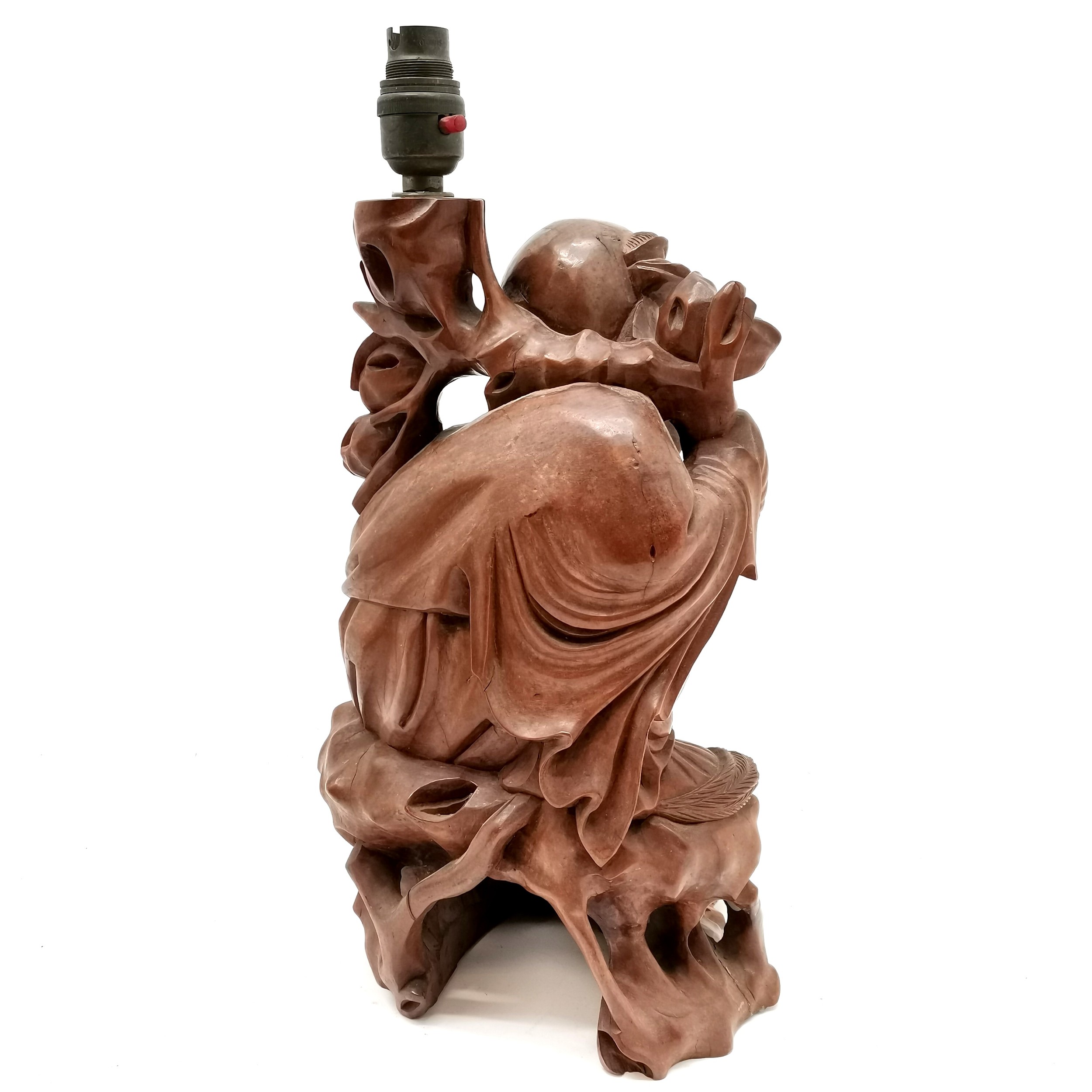 A Vintage oriental carved hardwood lamp in the form of a mandarin, holding flowers in 1 hand and - Image 2 of 4