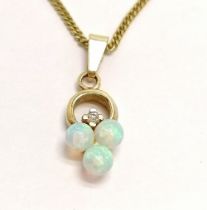 9ct hallmarked gold opal & diamond pendant on a 9ct hallmarked gold 50cm neckchain - total weight 3g
