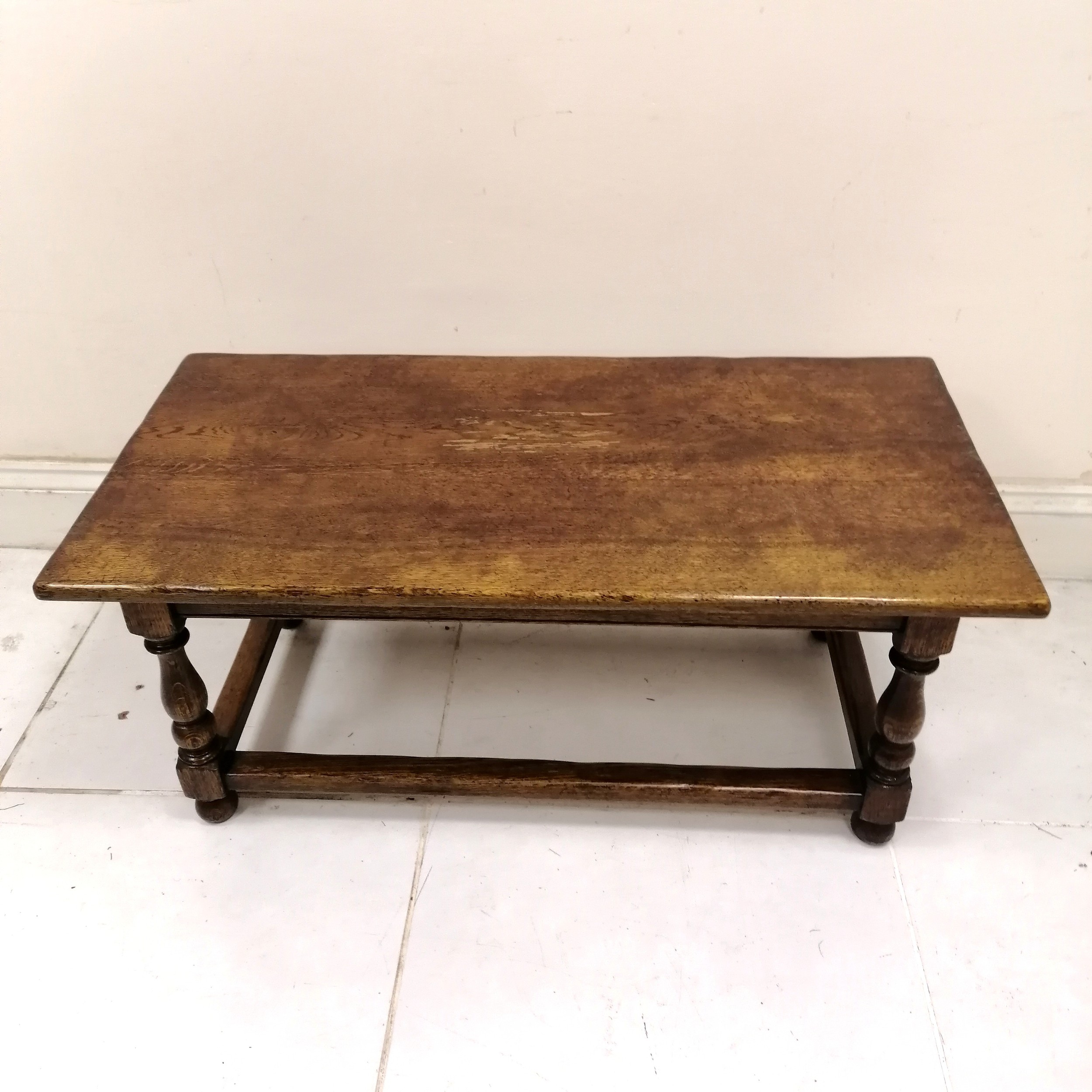 Oak refectory style coffee table with stretchered and turned base, in good used condition, 107 cm - Image 2 of 3