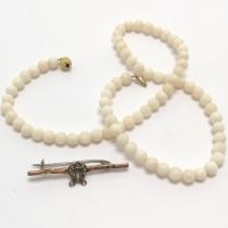 14ct gold clasp white coral bead necklace 40cm long T/W an antique 9ct gold marked bar brooch set