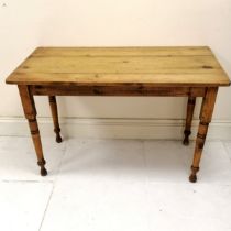 Antique Rustic pine table, on turned legs, in used condition, 120 cm wide x 62 cm deep x 76 cm high.