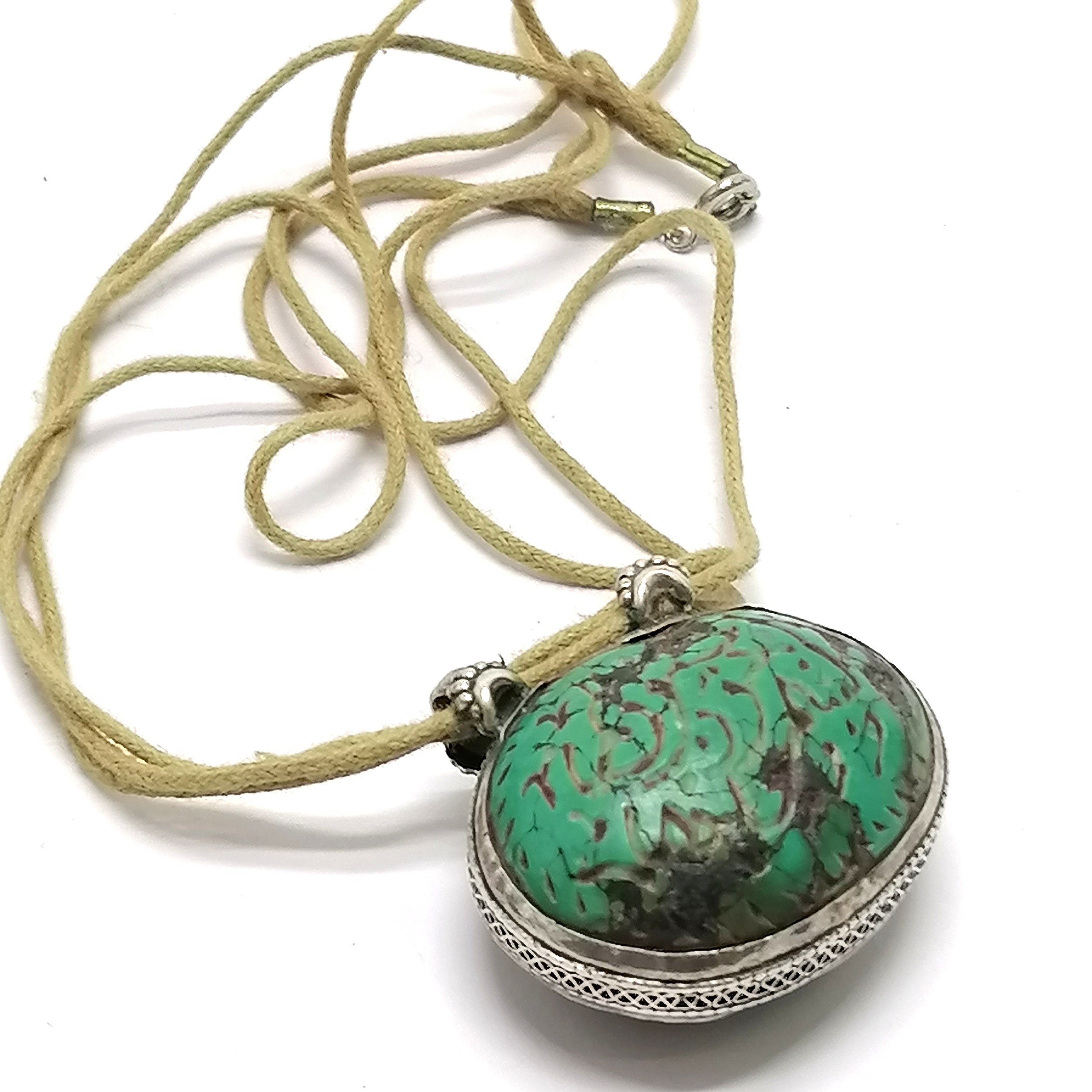 Antique Islamic carved turquoise amulet set in unmarked silver with text to one side and a deer to - Image 3 of 5