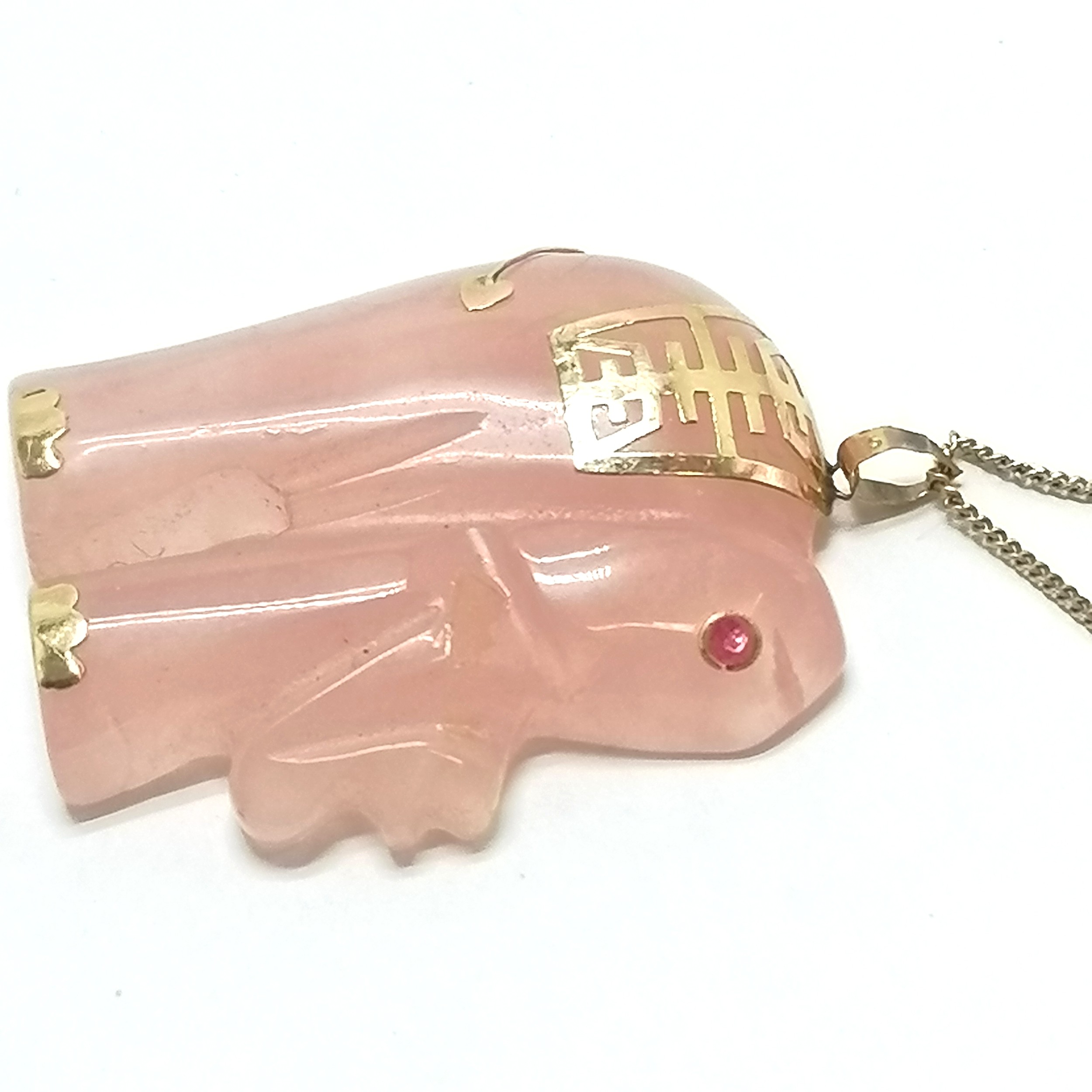 14k marked gold rose quartz elephant pendant with ruby eye (missing tusk) on a 9ct marked gold