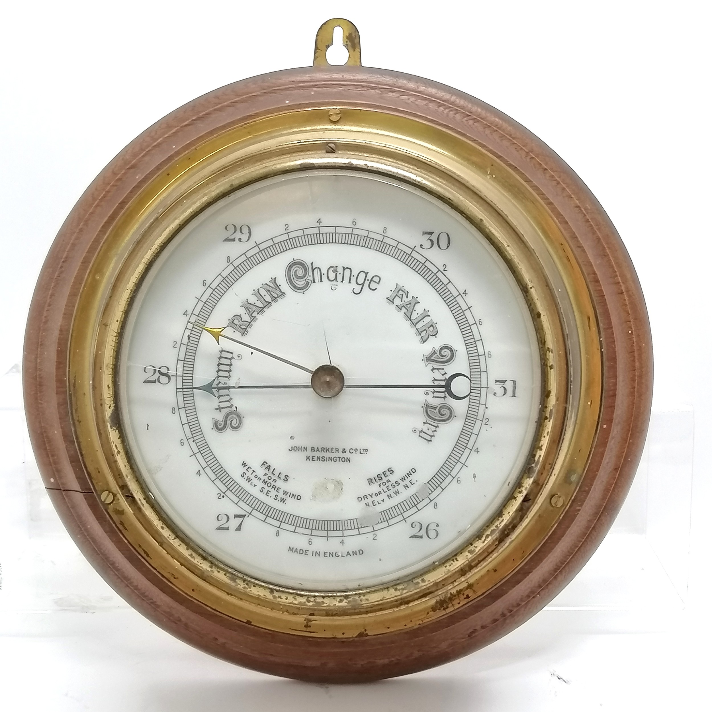 John Barker (Kensington) barometer in brass case on turned oak panel - 26cm diameter ~ glass a/f