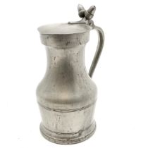French pewter covered jug decorated with acorns,in good condition, 26 cm high.