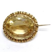 Antique citrine brooch in gilt metal mount - 2cm across