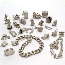 Qty of silver charms + 2 bracelets inc donald duck playing saxophone, toaster, Nuvo church +