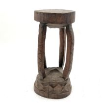 Tribal carved wooden stool43cm x 23cm - has loss to the top detail - some stress cracks