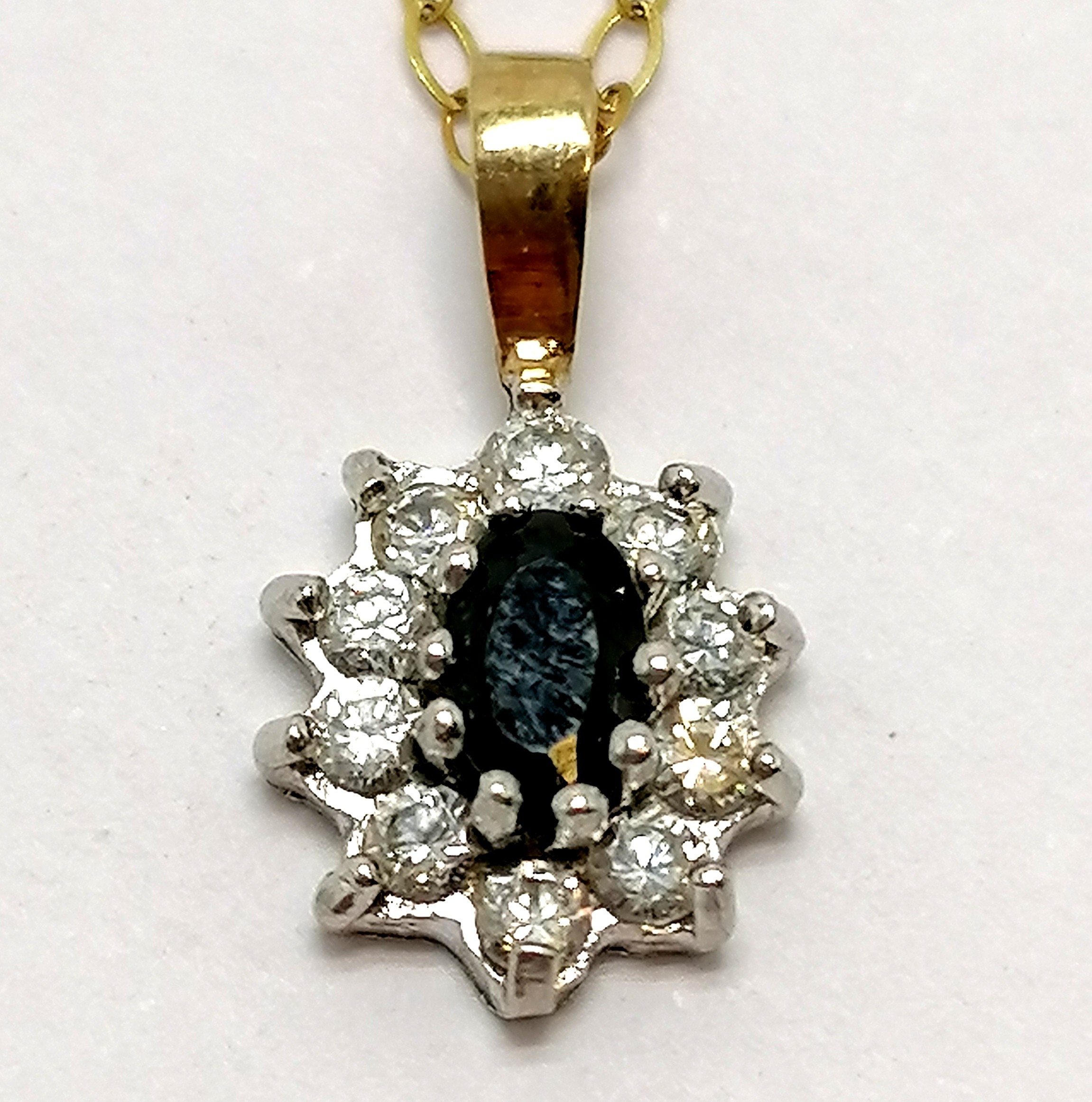 Unmarked gold sapphire & white stone pendant on a fine 9ct marked gold 40cm chain - total weight 1g - Image 3 of 3