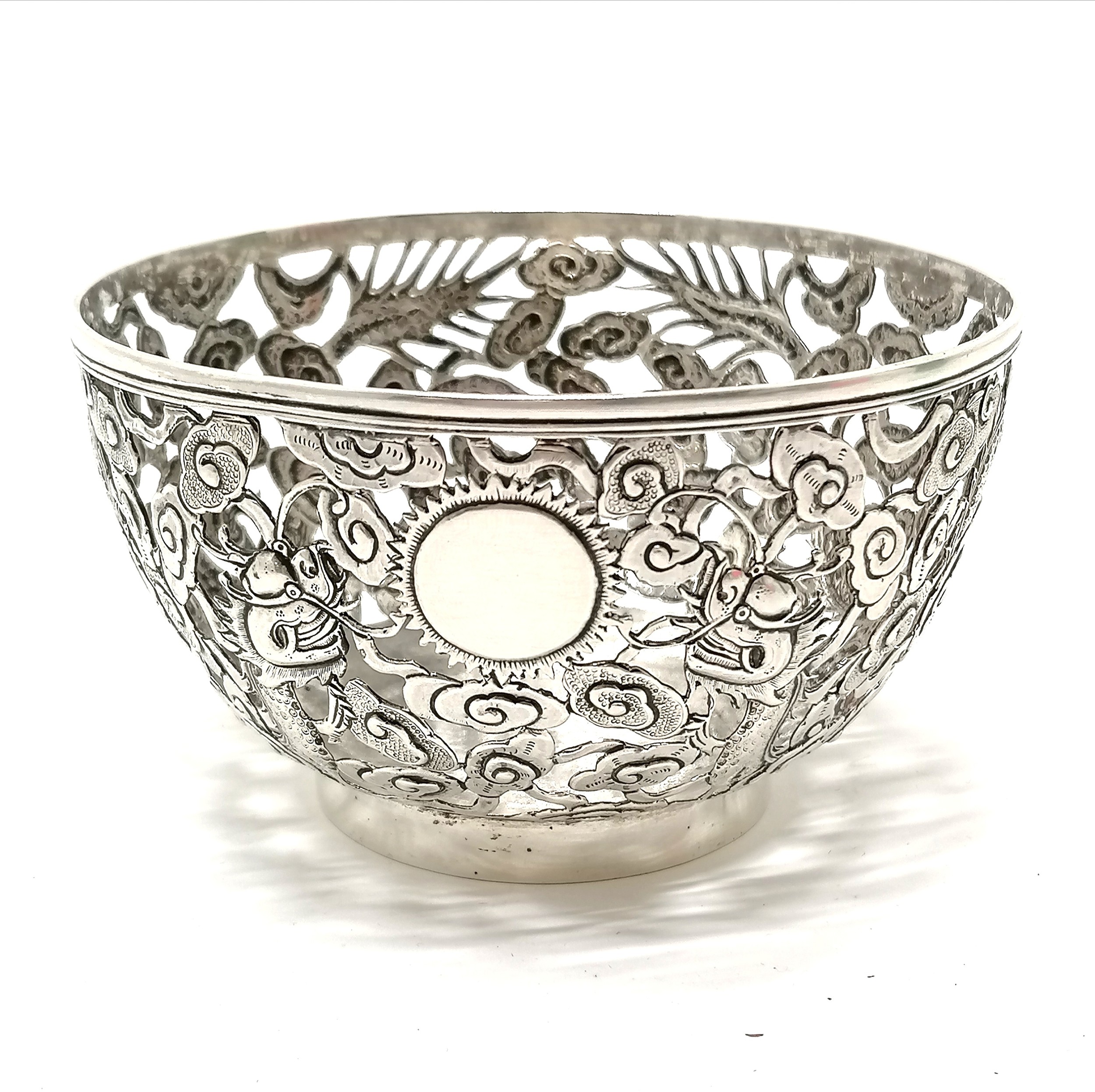 Chinese antique silver bowl with pierced decoration depicting 2 dragons & flaming pearl cartouche by