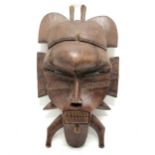 Tribal carved wooden mask 43cm x 23cm - has loss to the top detail