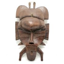 Tribal carved wooden mask 43cm x 23cm - has loss to the top detail