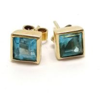 Pair of 9ct marked gold blue topaz stud earrings - 1.8g total weight