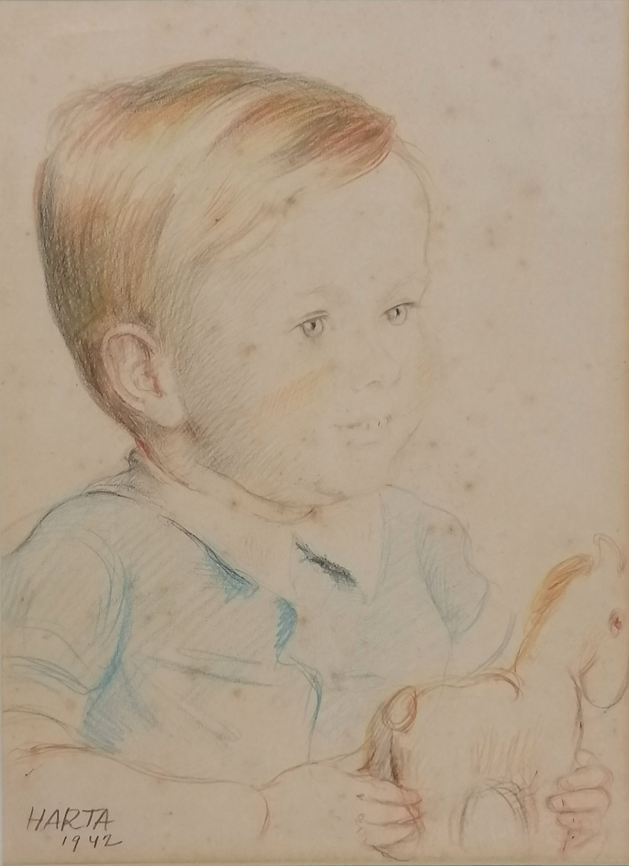 Felix Albrecht Harta (1884-1968) crayon sketch of young boy with toy horse dated 1942 - frame 58cm x