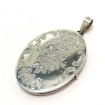 Silver marked engraved oval locket - 5cm drop & 10.6g total weight ~ no obvious damage