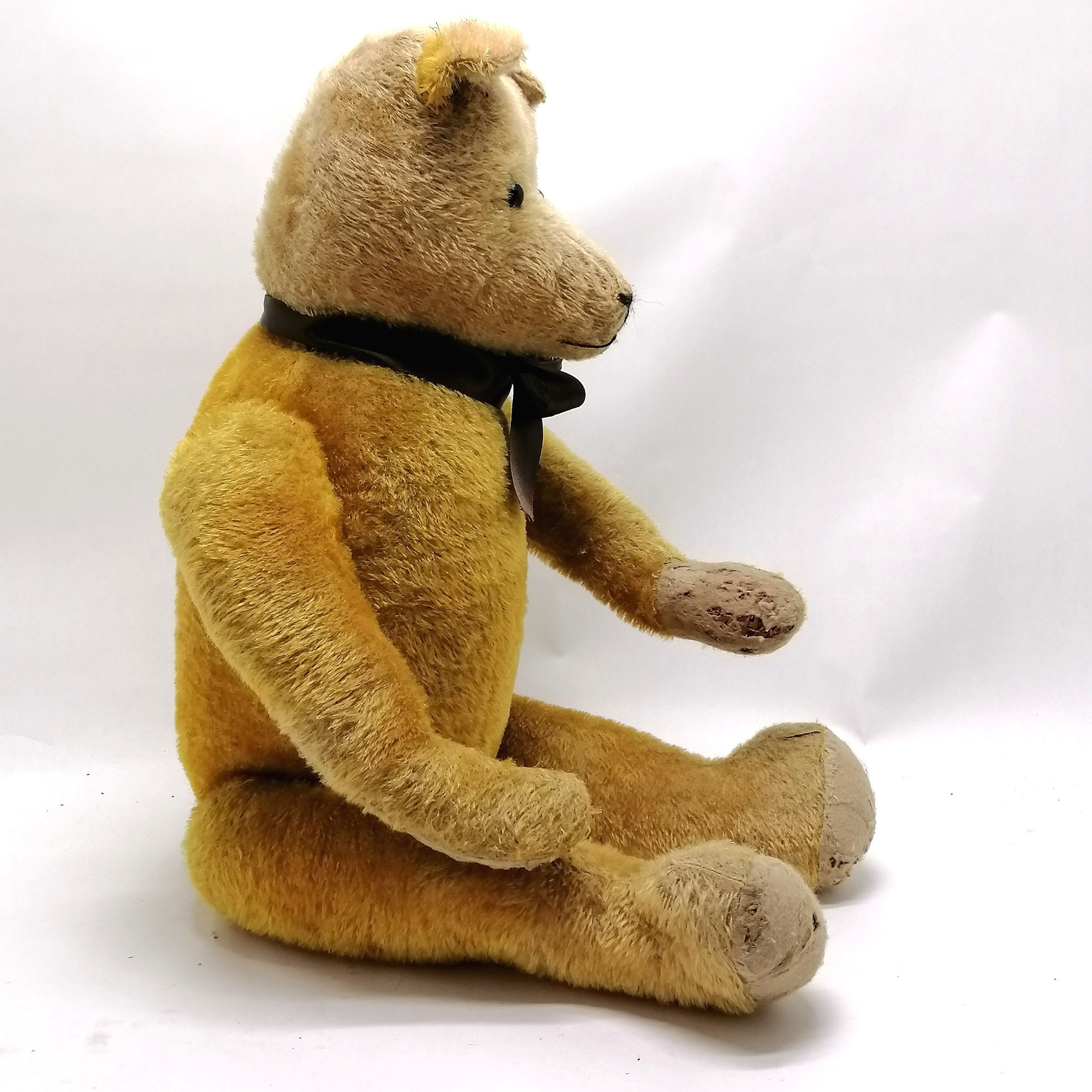 1926 large jointed teddy called Monty straw filled with glass eyes and stitched mouth and nose ( - Image 2 of 10