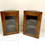 Pair of reproduction walnut glazed wall corner cupboards, in good condition, 51 cm wide x 29 cm deep