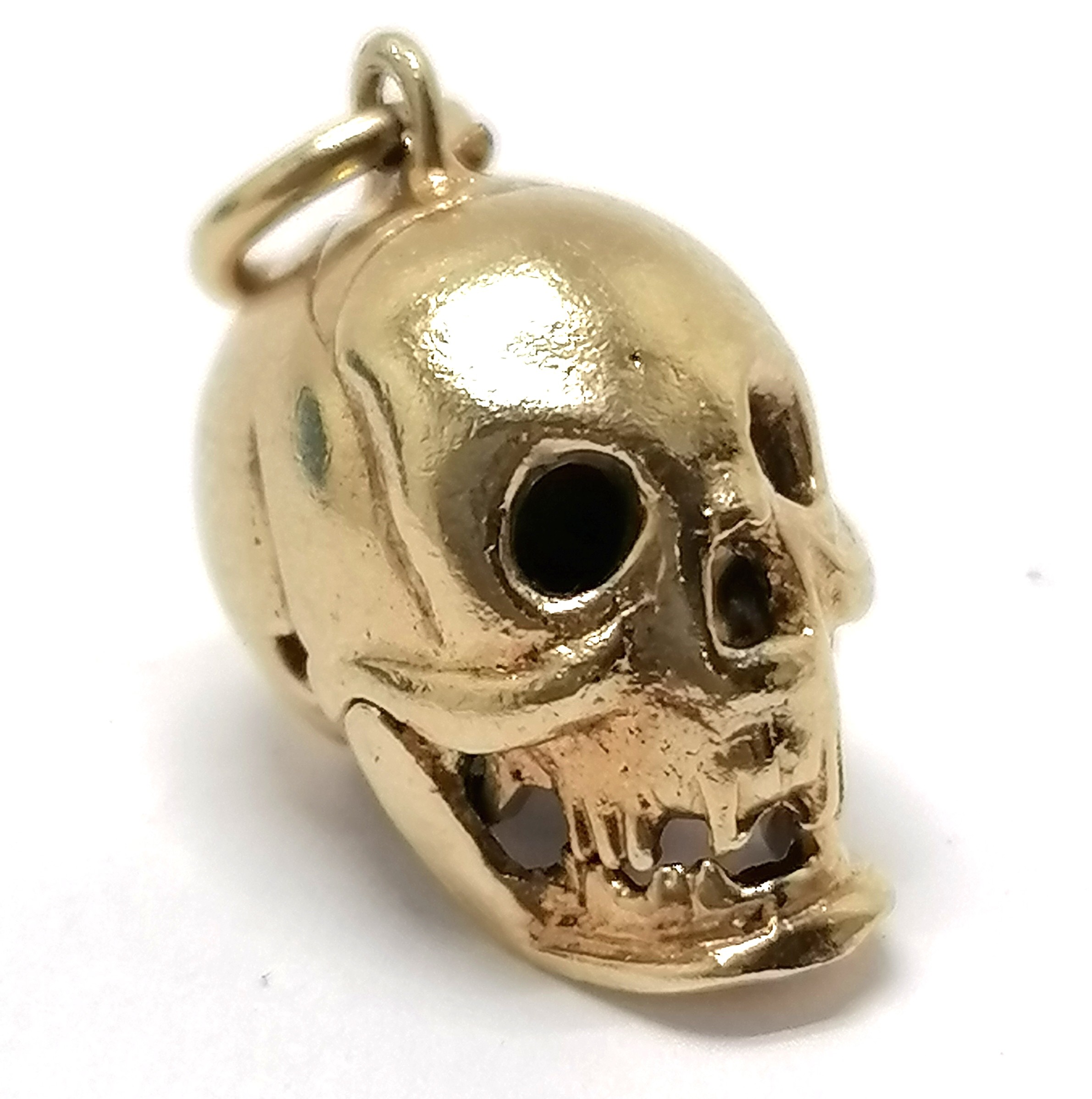 9ct hallmarked gold skull charm / pendant with articulated jaw 1cm high 2.6g