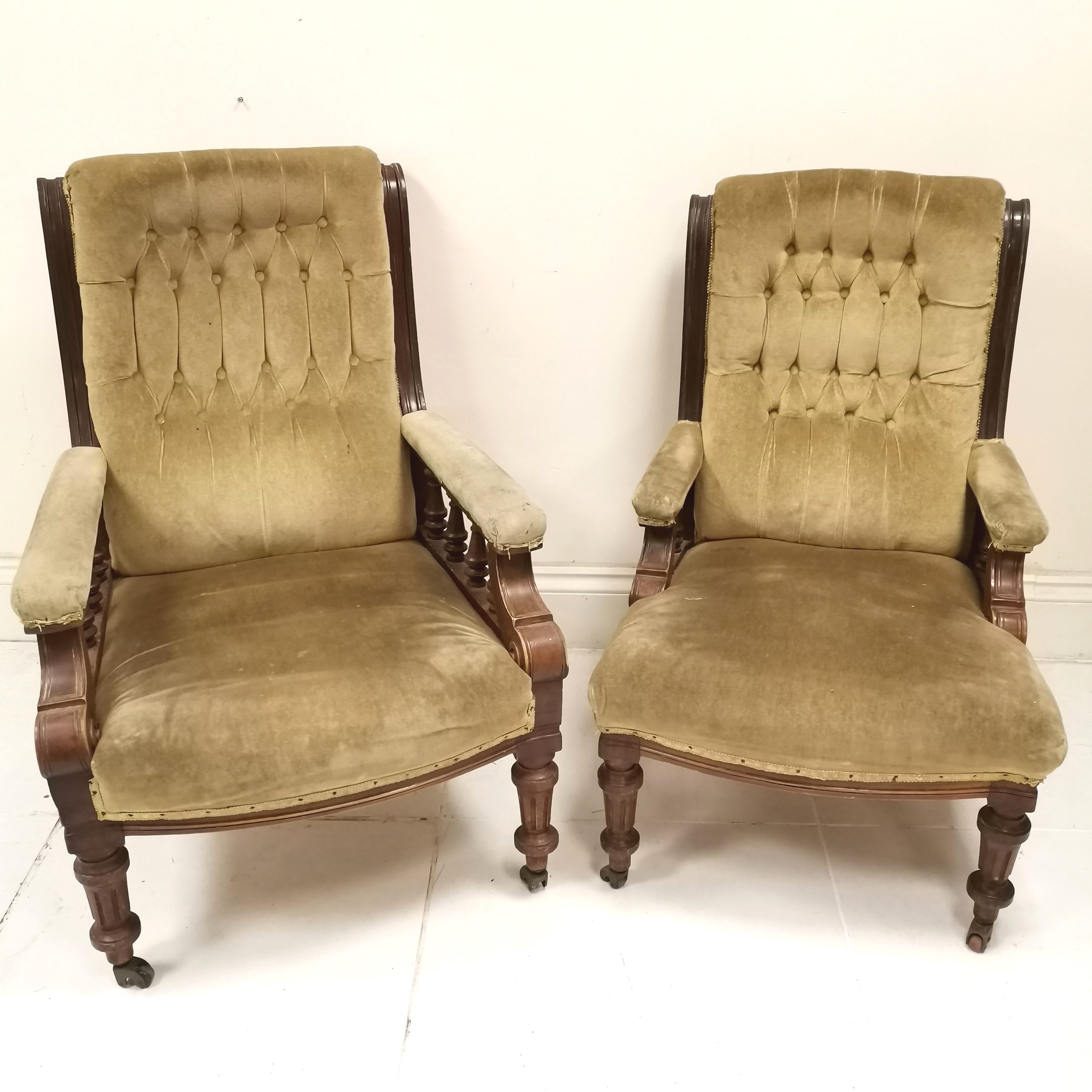 Pair of Antique mahogany framed button and scroll back Library chairs, upholstered in a light