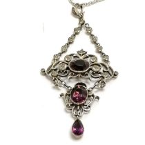 Antique unmarked silver paste purple + white stone set pendant (6.5cm drop) on a silver 60cm chain -